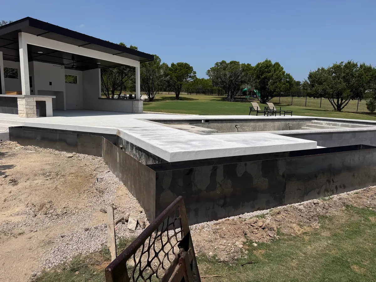 Steel planter walls along the pool deck, during construction